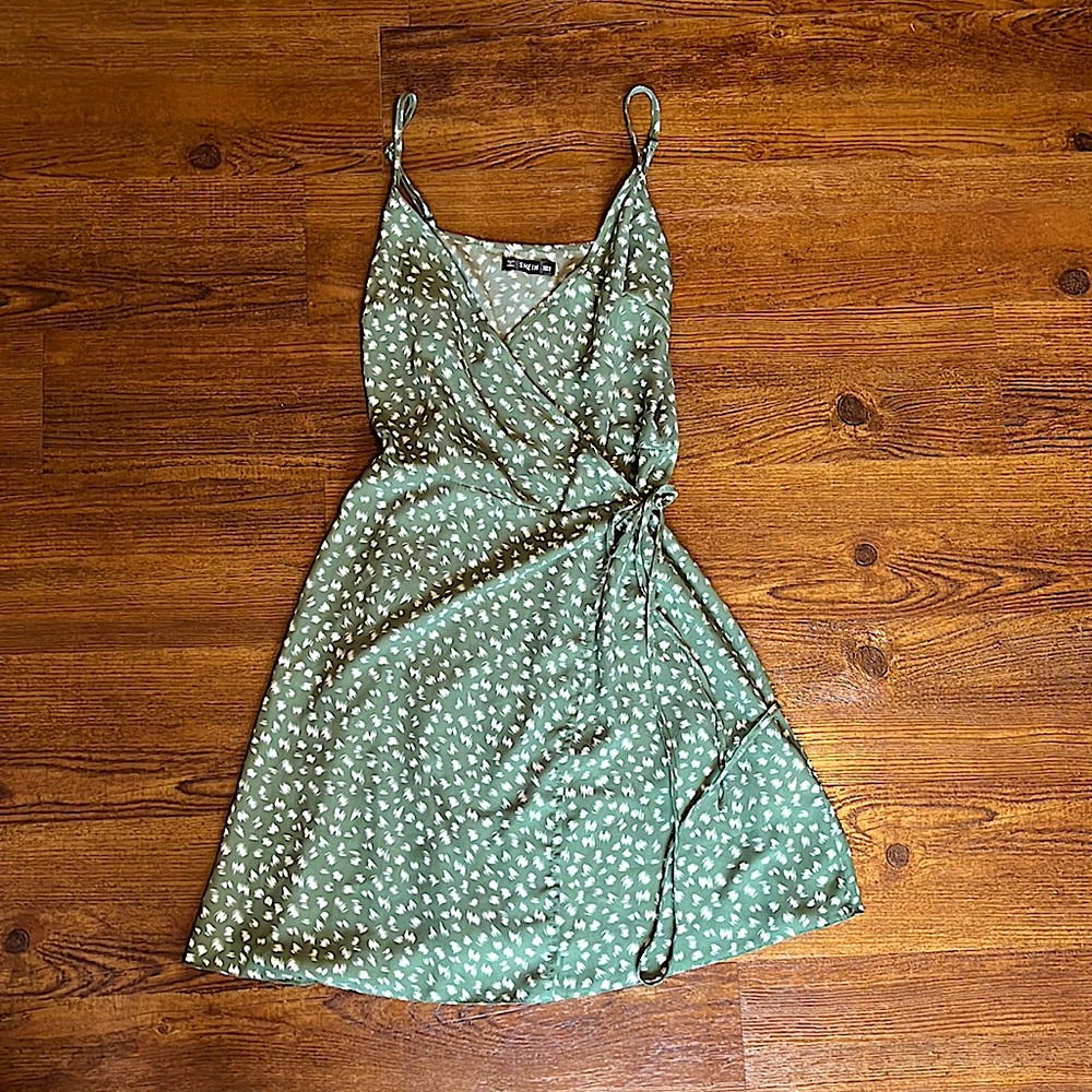 Sage green and white mini wrap dress. Light material flows. Worn once.